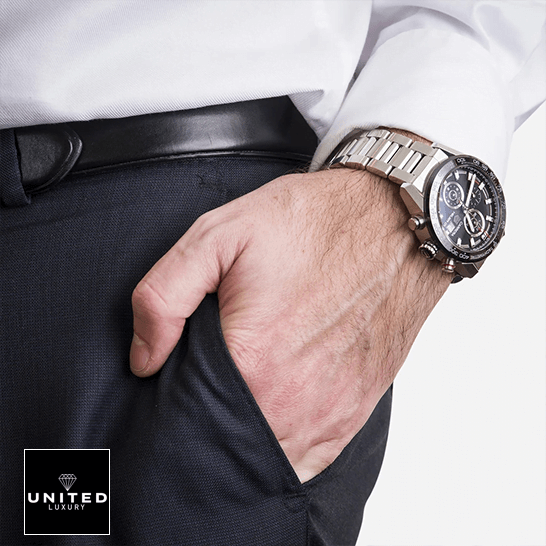 TAG Heuer Carrera Steel Black Replica 1 Tag Heuer Carrera Caliber Heuer 01 Stainless Steel Black Dial Replica man in a suit on his wrist